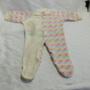 Vintage baby sleeper with a pastel checkered pattern and a character design 1977